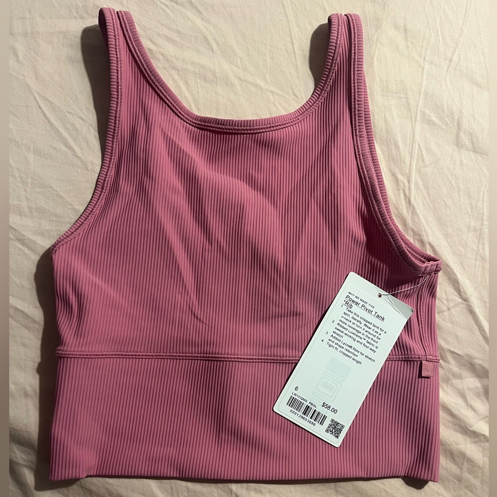 NWT LULULEMON POWER PIVOT RIBBED TANK TOP
Pink Blossom
Size: 6